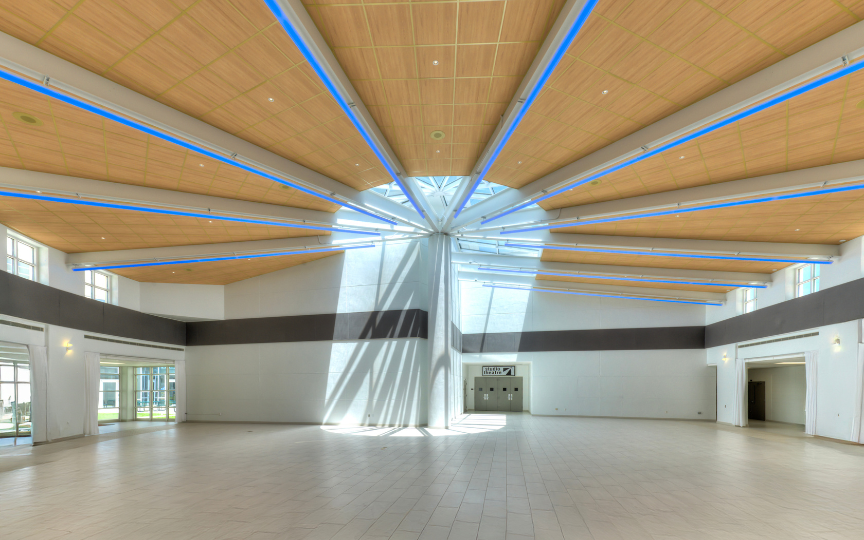 Bright white curved room outside of the Studio Theatre
